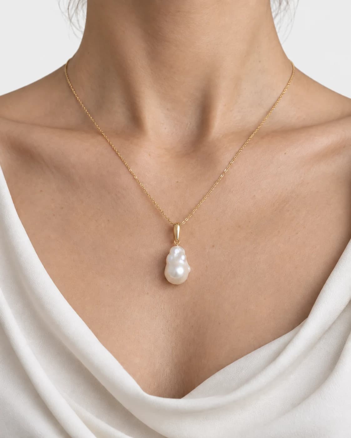 Baroque Pearl Drop, 14k Solid Gold — worn on a model