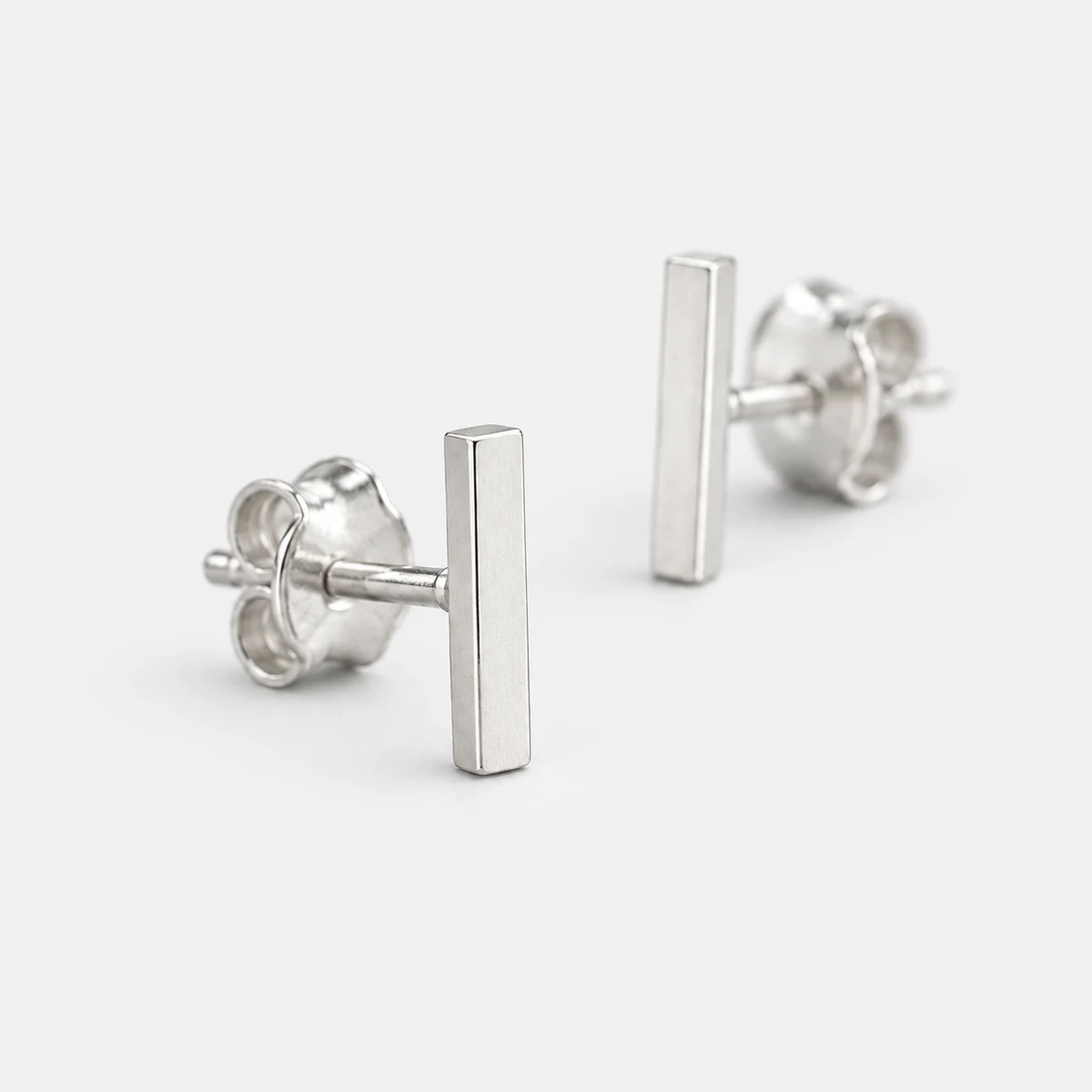 Hairline Bar Studs, Sterling Silver — close-up detail
