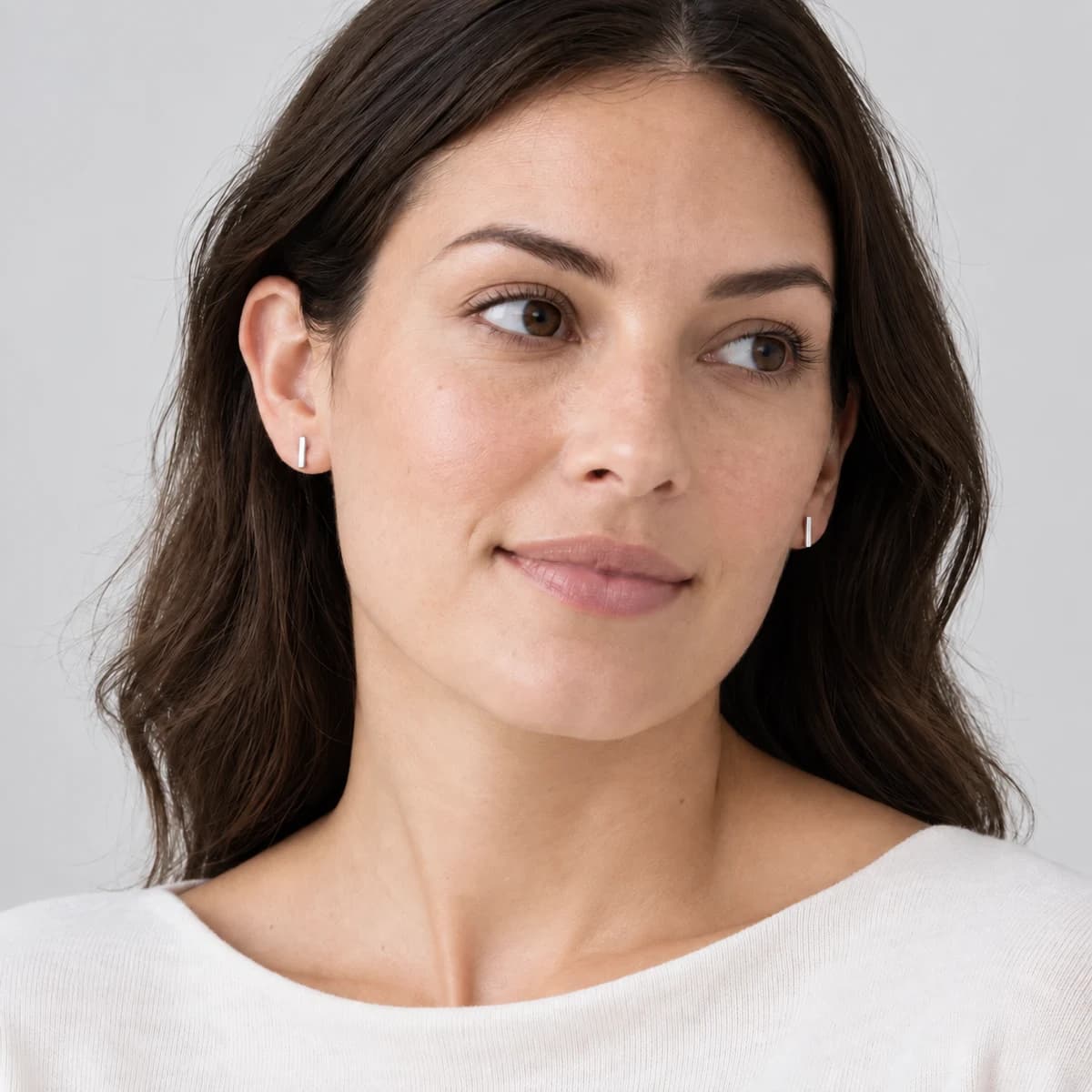 Hairline Bar Studs, Sterling Silver — worn on a model