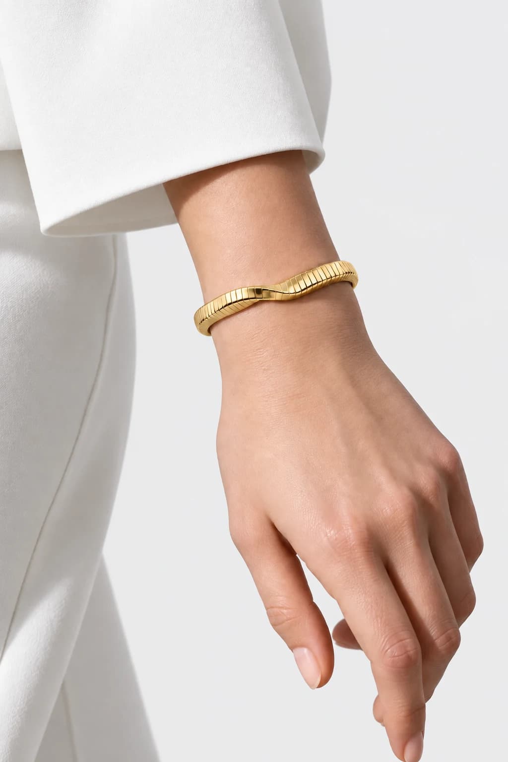 Möbius Twist Bangle, 18k Solid Gold — worn on a model