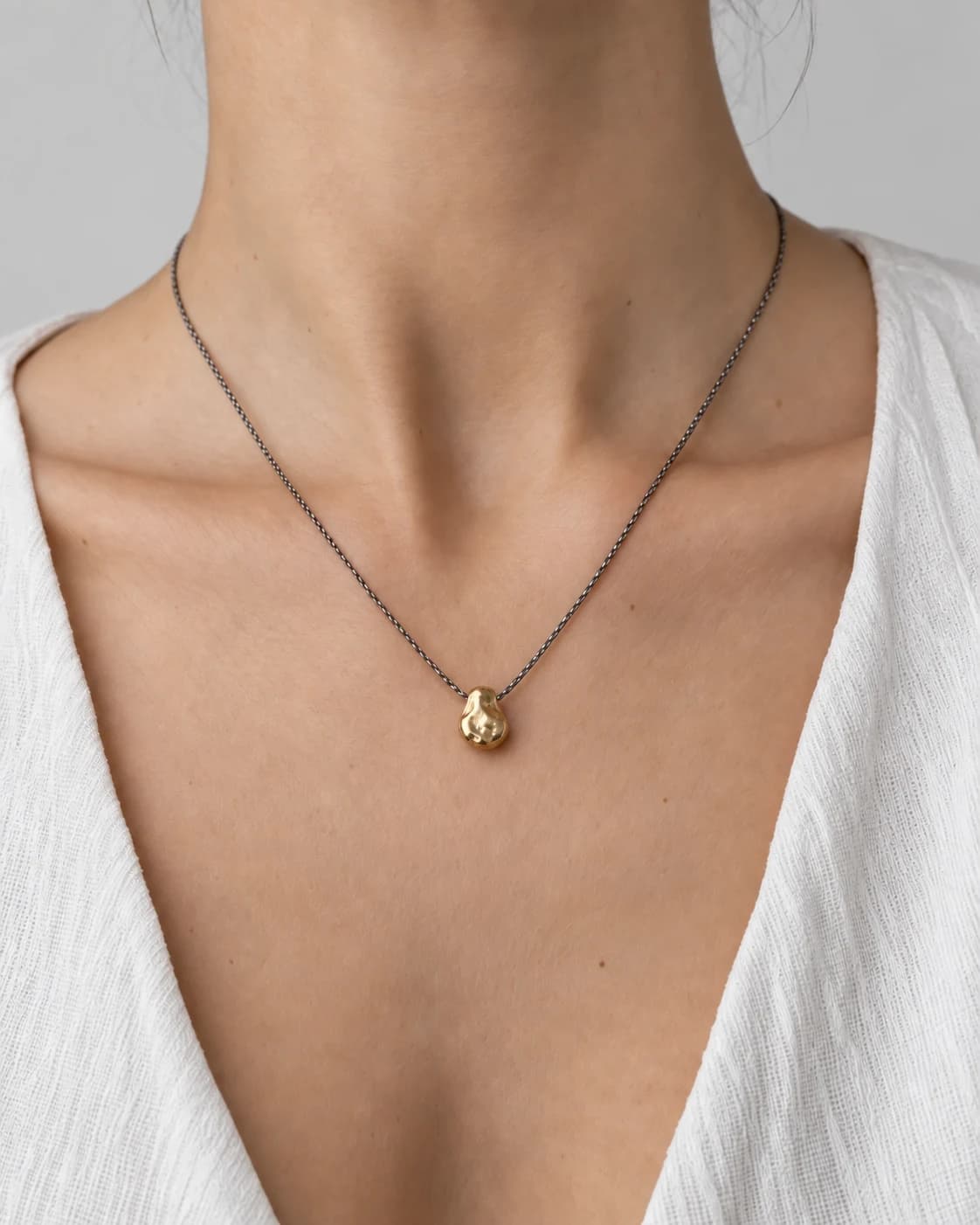 Raw Cast Nugget, Sterling Silver — worn on a model