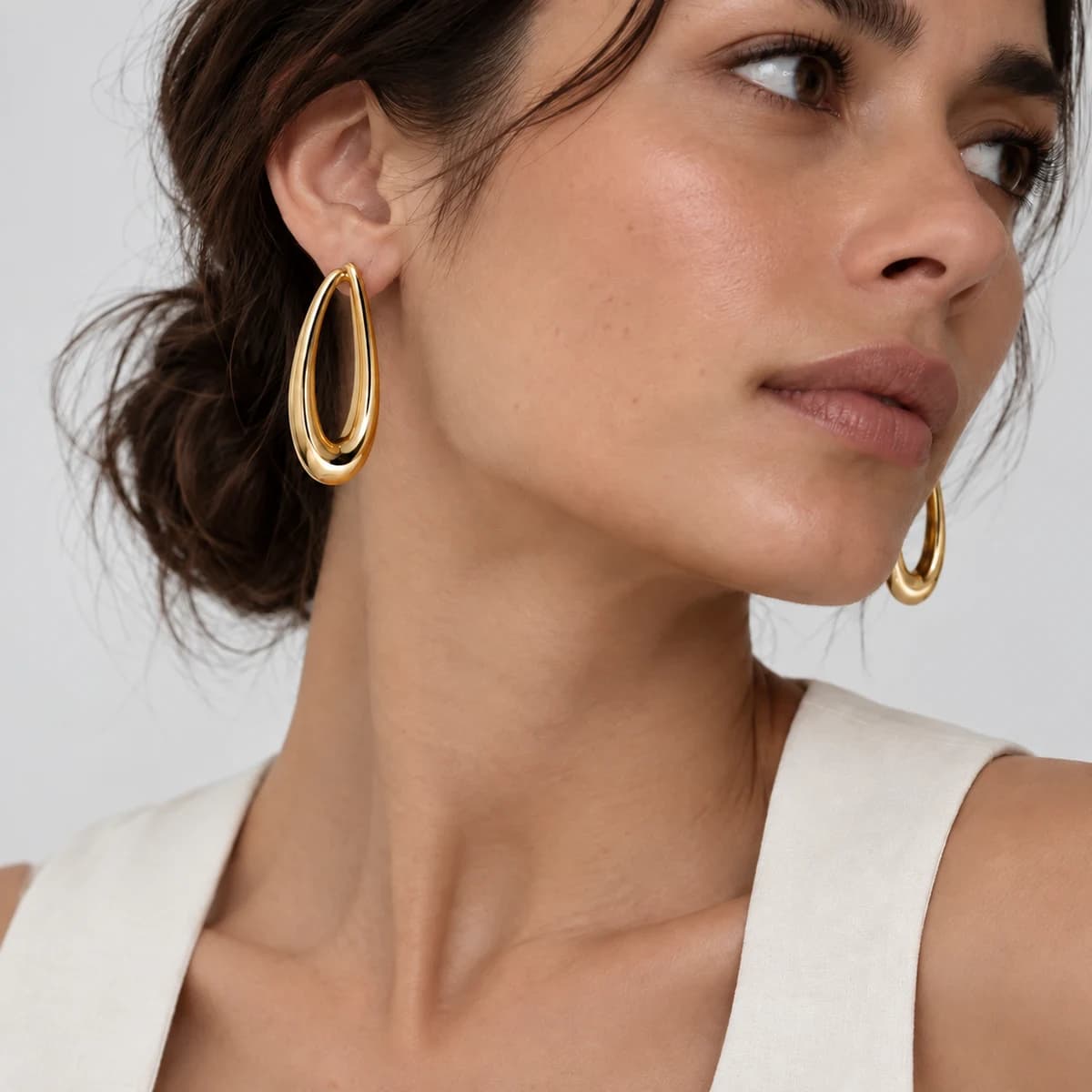 Sculptural Oval Drops, 18k Solid Gold — worn on a model