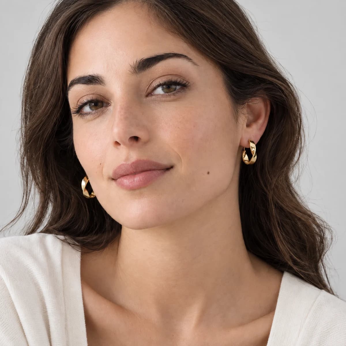 Twisted Ribbon Creoles, 18k Gold Vermeil — worn on a model